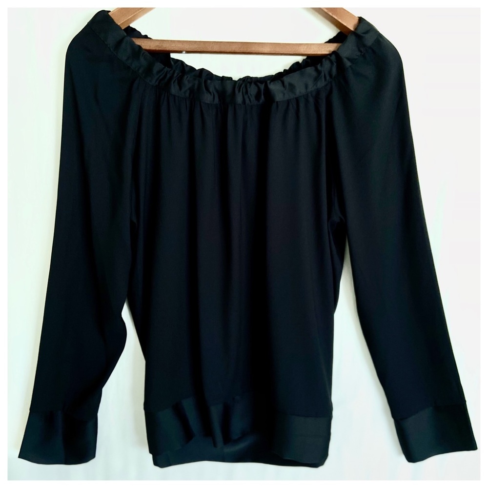 Elegant black top with satin trim